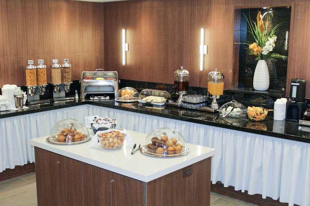 בושרוויל Hotel Welcominns מסעדה תמונה